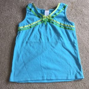 Blue tank with green and yellow ribbon